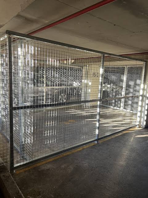 Weldmesh enclosure around an outdoor industrial storage yard