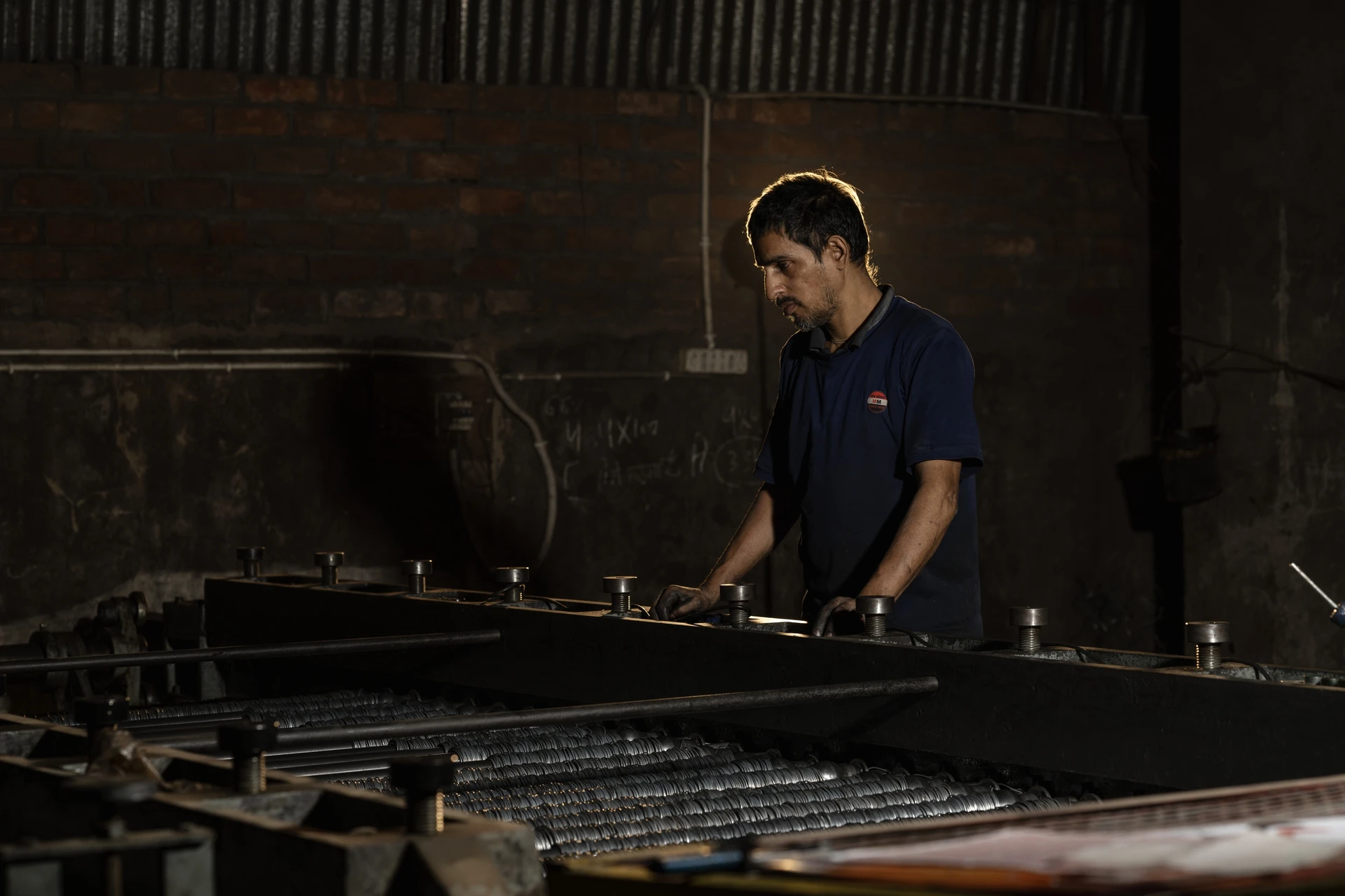 MM Industries production team working on the weldmesh shop floor